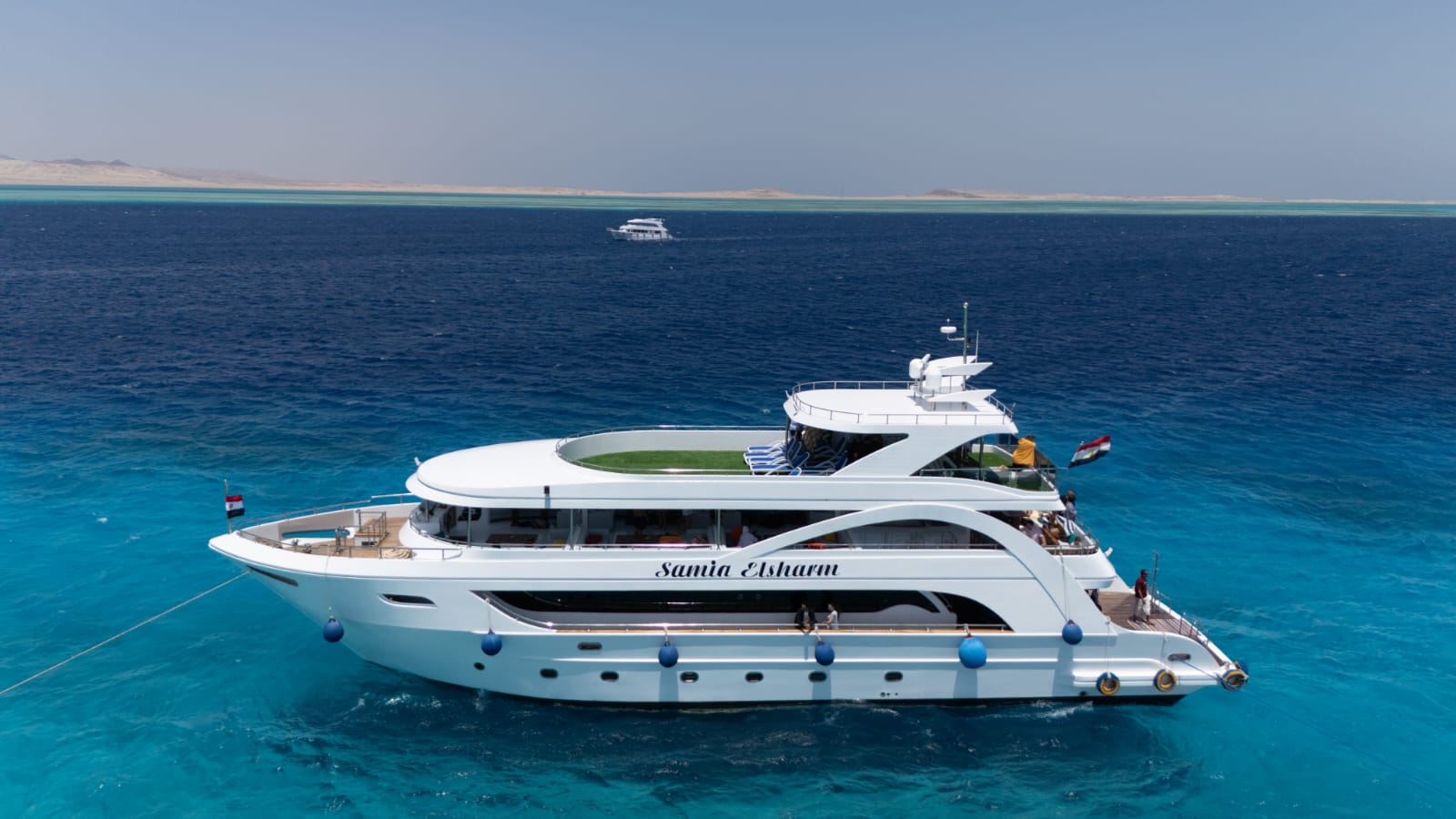 Escursione in Barca di Lusso all’Isola Che Non C’è con Trasferimento in Zodiac